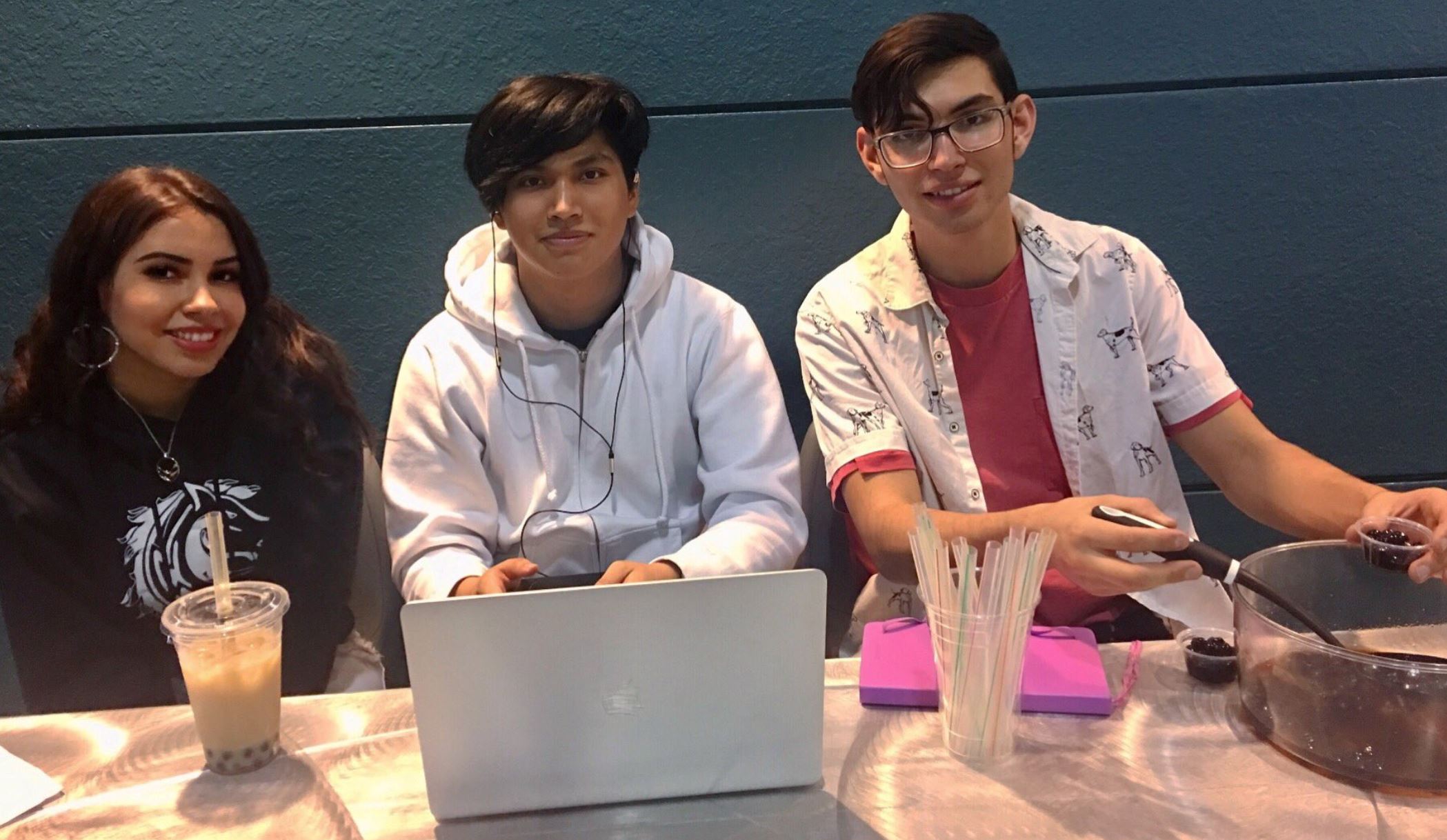 student entrepreneurs at laptop